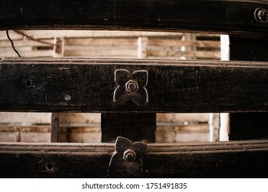 Small Woode Flower Nail On The Old Wooden Beam Close Up Vintage