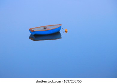 Small Wooden Boat On The River Axe, Devon