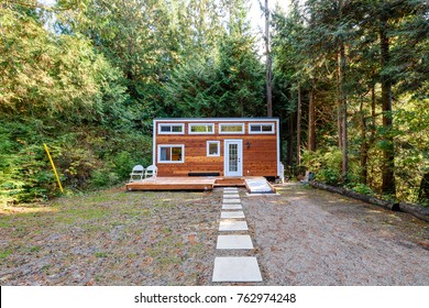 Small wooden cabin house. Exterior design.