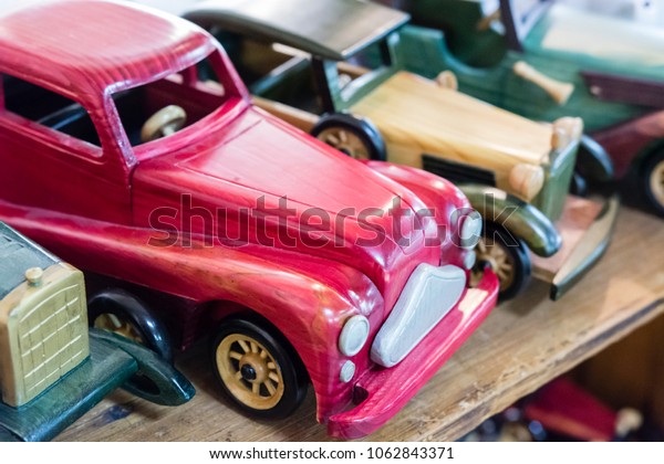 Small wooden car in\
the shape of veterans.