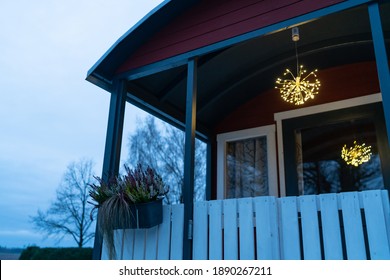 Small Wooden Caravan Parked In The Garden. Nice Home Made Travel Home On Wheels. Nice Warm Place For Winter. Small Cottage House With Sauna. Static Home. Outdoor Living Space. Modern Caravan Home