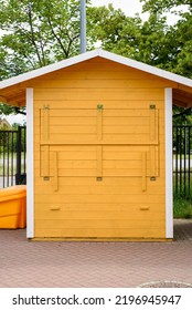 Small Wooden House, Beautiful Wooden Stall In The Square, Yellow Small Gazebo. Outdoor  Market Stand. Tool Box. Tool Sheds. Wooden Market Stand Stall Made Of Natural Wooden Beams Tree Hut.