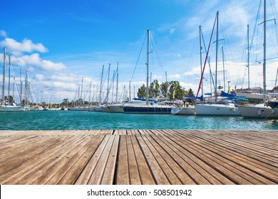 Small Wooden Jetty In The Background The Port Yacht