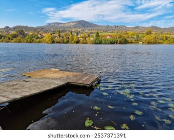 A small wooden pier for fishing on the Elbe river. Czech Republic, Europe. - Powered by Shutterstock