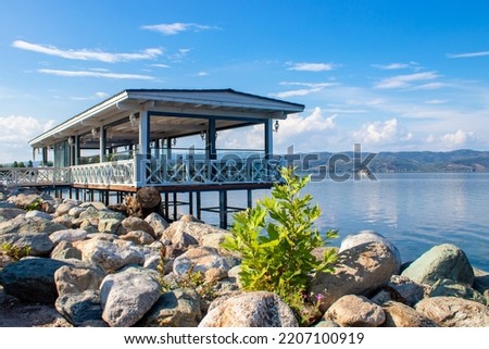 A small wooden restaurant built on the lake with a beautiful view of the water area of ​​the lake. Sapanca lake, Sakarya.