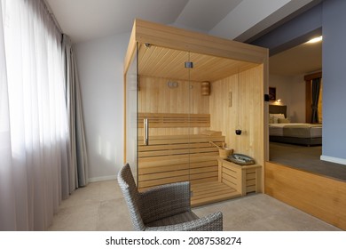 Small wooden sauna in a hotel room