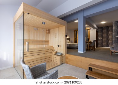 Small wooden sauna in a luxury hotel apartment