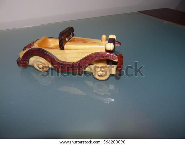 Small wooden toy\
car