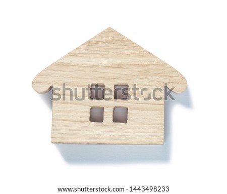 small wooden toy wood house symbol isolated on white