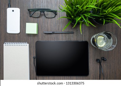 A small workplace with a tablet in a cafe.