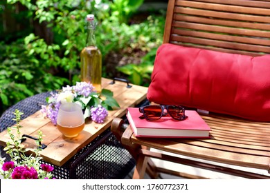 Small Yard Garden With Sheltered Deck And Patio For Mindful Relaxation On A Warm Summer Afternoon During A Lockdown Staycation Vacation