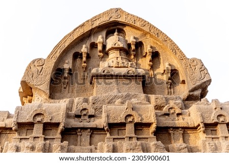 The smallest is Draupadi Ratha, which resembles a mud cottage with a thatched Bengal roof. The gateway faces west and is flanked by two dwarapalikas.