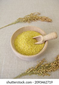 Small-seeded millet in a wooden bowl