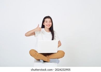 Smart Attractive Young Woman Use Laptop Computer Sitting Cross Legged On Gray Studio Background