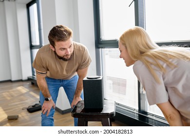 Smart Audio Speaker. Voice Assistant Helper At Home Used By Family Couple. Portrait Of Caucasian Man And Woman Use Modern Technology Innovation Device, Listen. Copy Space