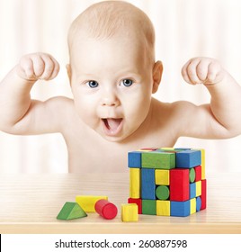 Smart Baby Playing Toy Blocks, Strong Healthy Child Laughing, Hand Raise Up, Little Kids Success Early Development And Activity Concept, Jigsaw Puzzle Game