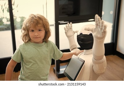 Smart Boy Child Communicate With Robot Assistant Technology For Modern Education, Innovation