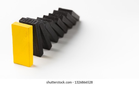 Smart Business Management. Domino Effect Stopped By Unique Strong Piece, White Panorama Background With Free Space