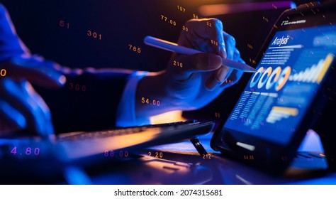 Smart businessman hand close up NFT financial data on mobile laptop futuristic stock chart graphic, Business investor stock exchange market and crypto currency data analytics digital technology - Shutterstock ID 2074315681