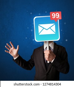 Smart businessman holding square sign with mail icon Stock Photo