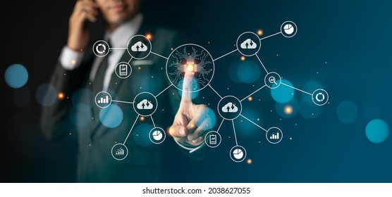 Smart businessman in suit communicates around the world  - Shutterstock ID 2038627055