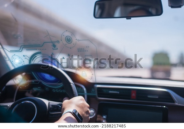 Smart car (HUD)\
concept. Empty cockpit in vehicle and Self-Driving mode car graphic\
screen with flare light