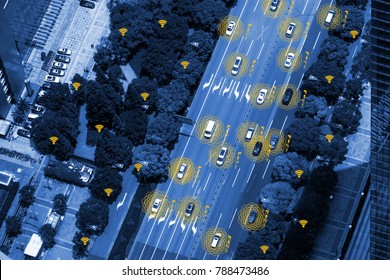 Smart car (HUD) , iot , Autonomous self-driving mode vehicle on metro city road iot concept with graphic sensor radar signal system and internet sensor connect. Blue tone image. Bird eye view.
