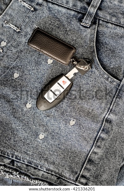 smart car key over girl\
jeans