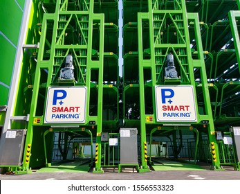 Smart Car Park Using Rotary Lift Technology System To Create More Multiple Space And Increase Number Of Parking Lot. Innovative Solution For Small Or Narrow Parking Area In Urban City