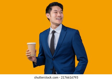 smart casual asian businessman formal suit walking hand hold coffee cup looking above while smiling cheerful inspired creative ideas thinking studio shot on yellow colour background - Powered by Shutterstock