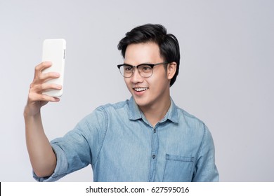 Smart Casual Asian Man Taking Selfie Photo By Smartphone