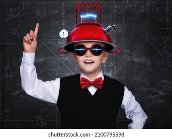 Smart Child Pretend To Be Inventor. Funny Kid Wearing Helmet . Education, Artificial Intelligence And Business Idea Concept