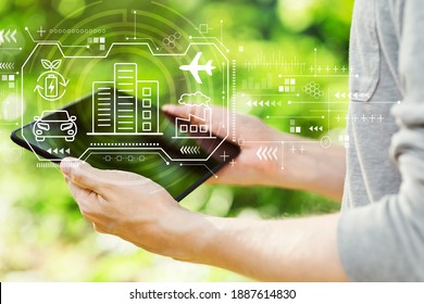 Smart City Concept With Young Man Holding His Tablet Computer Outside