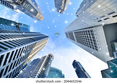 Smart city and wireless communication network on skyscrapers Central Business District in Singapore background, Financial modern technology concept