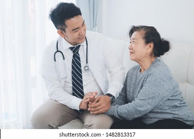 Smart Doctor Visit Elderly Woman At Home For Check Up,Elderly Health Care Concept.
