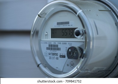 A smart electric power meter measuring power usage - Shutterstock ID 709841752
