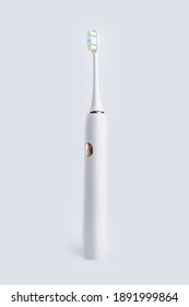 Smart electric toothbrush. Modern technology for health. Healthy teeth. Dentistry. Concept of professional oral care and healthy teeth by using ultrasonic smart toothbrush. 