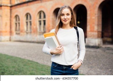Smart Female College Student On Campus Outdoors