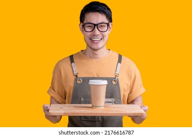 Smart Friendly Asian Male Glasses Barista Small Coffee Shop Owner In Apron Hand Gesture Welcome Customer Come And Enjoy His Coffee Drink,happy Asia Man Show Coffee With Smile And Confident Studio Shot