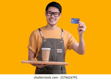 Smart Friendly Asian Male Glasses Barista Small Coffee Shop Owner In Apron Hand Gesture Welcome Customer Come And Enjoy His Coffee Drink,happy Asia Man Show Coffee And Credit Card Online Studio Shot