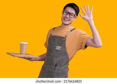 Smart Friendly Asian Male Glasses Barista Small Coffee Shop Owner In Apron Hand Gesture Welcome Customer Come And Enjoy His Coffee Drink,happy Asia Man Show Coffee With Smile And Confident Studio Shot