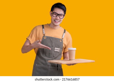 Smart Friendly Asian Male Glasses Barista Small Coffee Shop Owner In Apron Hand Gesture Welcome Customer Come And Enjoy His Coffee Drink,happy Asia Man Show Coffee With Smile And Confident Studio Shot