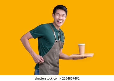 Smart Friendly Asian Male Glasses Barista Small Coffee Shop Owner In Apron Hand Gesture Welcome Customer Come And Enjoy His Coffee Drink,happy Asia Man Show Coffee With Smile And Confident Studio Shot