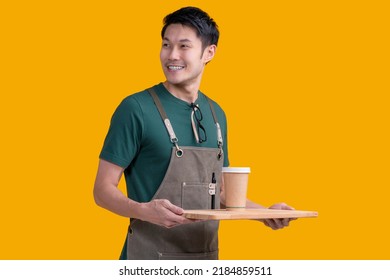 Smart Friendly Asian Male Glasses Barista Small Coffee Shop Owner In Apron Hand Gesture Welcome Customer Come And Enjoy His Coffee Drink,happy Asia Man Show Coffee With Smile And Confident Studio Shot
