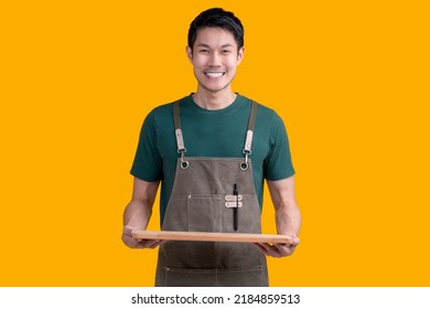 Smart Friendly Asian Male Glasses Barista Small Coffee Shop Owner In Apron Hand Gesture Welcome Customer Come And Enjoy His Coffee Drink,happy Asia Man Show Coffee With Smile And Confident Studio Shot