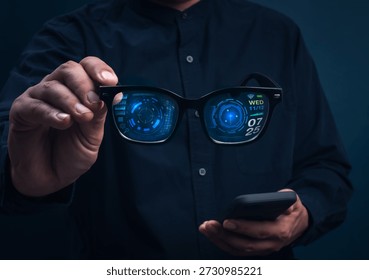 Smart glasses with augmented reality interface showing digital data and futuristic UI holding in businessman hands. Concept of wearable technology, AR innovation, and next-generation smart devices. - Powered by Shutterstock - Get 15% off with code: PIKWIZARD15