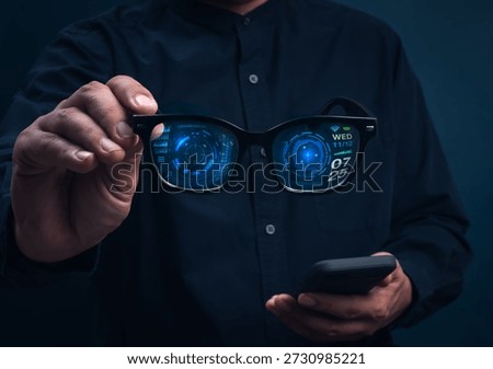 Smart glasses with augmented reality interface showing digital data and futuristic UI holding in businessman hands. Concept of wearable technology, AR innovation, and next-generation smart devices.