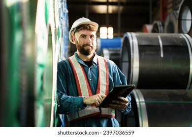 Smart and good looking senior factory or mechanical engineer standing in the factory portrait, caucasian white male engineer or foreman portrait in factory. - Powered by Shutterstock