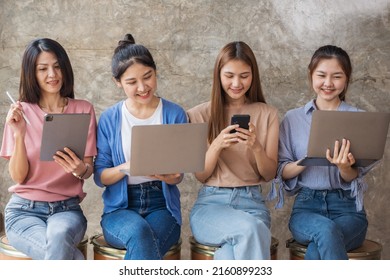 Smart Group Asian Creative Business People Using Electronic Devices Tablet Phone And Laptop In Office. Creative Lifestyle Young People Concept