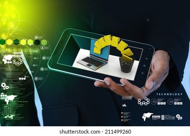 Smart hand showing tablet computer with file transfer - Powered by Shutterstock